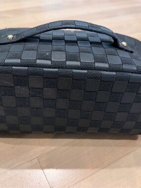 Amazon make up bag. Excellent condition. Used once.